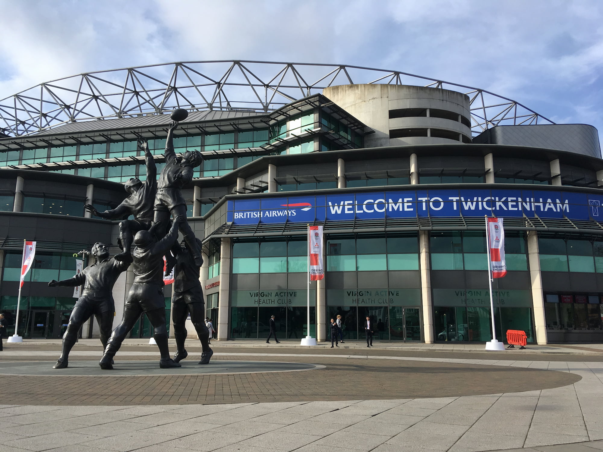 Exterior view of Twickenham Stadium with the “Welcome to Twickenham” banner, where The Deal Clinic event attended by Rose Lock Property Ltd took place.